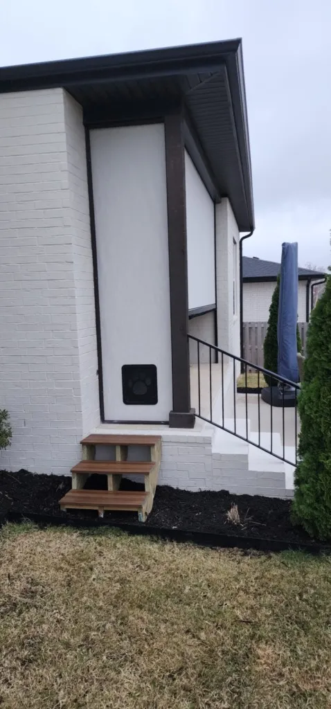 Shadow Valley subdivision Rogers Arkansas fixed screen with doggie door and steps added