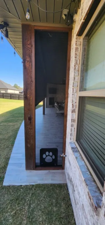 Fix screen with doggie door installed outdoor patio