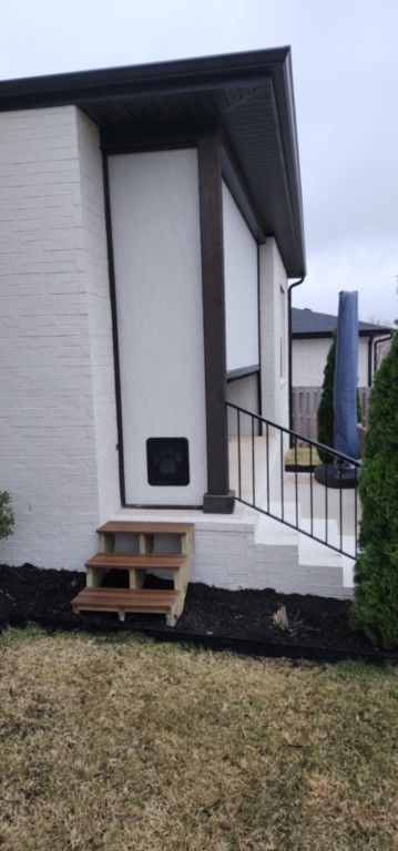 Shadow Valley subdivision Rogers Arkansas fixed screen with doggie door and steps added Shadow Valley subdivision Rogers Arkansas fixed screen with doggie door and steps added