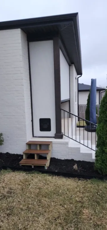 Shadow Valley subdivision Rogers Arkansas fixed screen with doggie door and steps added